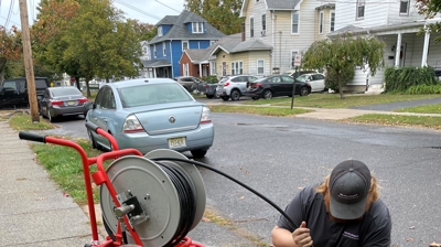 Hydro Jetting Technicians Performing Drain Cleaning Photo